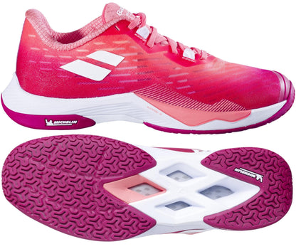 The Babolat Shadow Tour 5 Women's Badminton Shoes in Raspberry boast a chic red and pink design with white details. These lightweight and breathable shoes showcase laces from the top view, while the textured sole ensures excellent grip. The "Michelin" logo near the base makes these shoes ideal for high-energy matches.