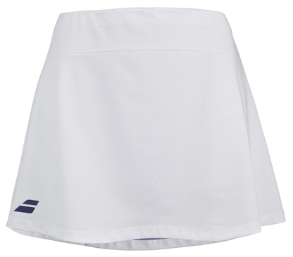 The Babolat Play Women's Badminton Skirt in white showcases a subtle blue Babolat logo near the hem. This knee-length design, crafted with Fiber Dry material, features a wide waistband for maximum comfort, making it an ideal choice for women's badminton.