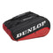 The Dunlop CX Performance 12 Racket Thermo Bag in black and red comes with multiple compartments and showcases a large white "Dunlop" logo on its side, making it ideal for stylishly carrying up to 12 rackets.