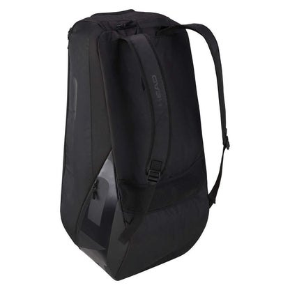 The HEAD Pro X Legend 9 Badminton Racket Bag L - Black, a sleek triangular-shaped sports backpack from the renowned brand HEAD, includes adjustable shoulder straps, a mesh pocket, and a top zipper. Its sophisticated design and CCT+ climate control technology make it ideal for carrying equipment or personal items like your badminton gear.