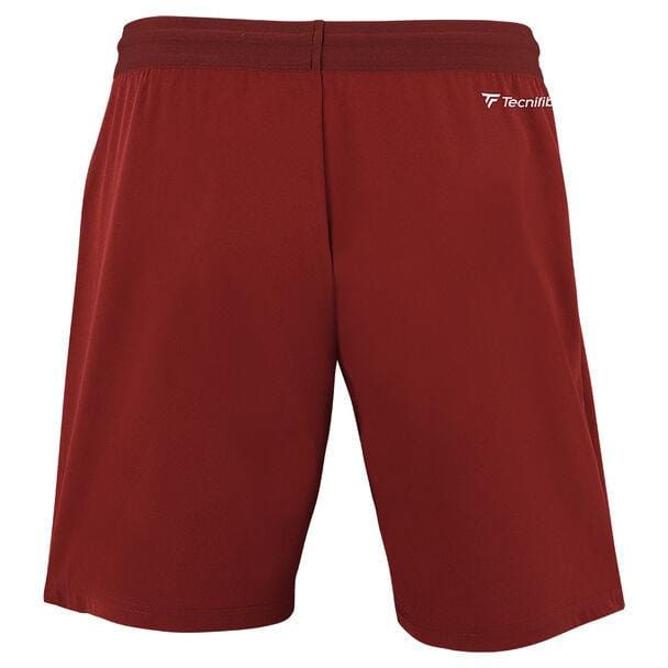 A pair of cardinal Tecnifibre Men's Team Badminton Shorts featuring the logo on the back. The fabric ensures maximum lightness and optimal ventilation, making it perfect for both sports and casual wear.