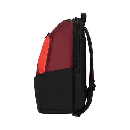 Side view of the sleek Dunlop CX Performance Badminton Backpack in black and red, showcasing its modern design with padded shoulder straps, a compartmentalized layout, and a convenient racket holder for versatile use.