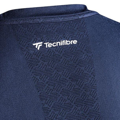 Close-up of the Tecnifibre Mens Badminton Seamless Baselayer in Marine, showcasing a subtle textured pattern ideal for cold-weather sports training. The iconic Tecnifibre logo is printed in white on the upper back area.