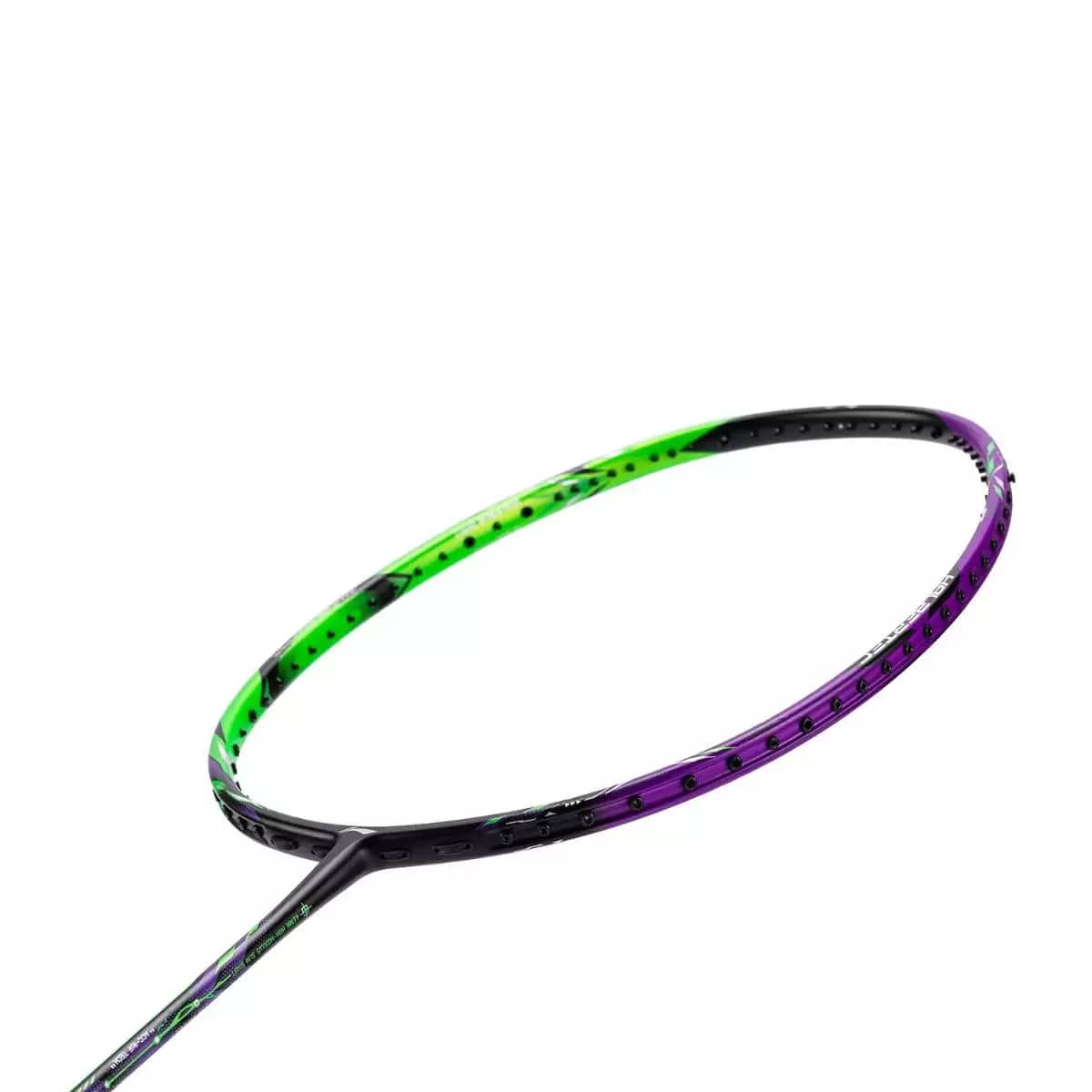 The image captures a detailed view of the racket head from the Li-Ning Halbertec 9000 Badminton Racket, showcasing its distinctive ACC Rifftech frame in vibrant shades of Green Crystal and Dragons Violet. The focus is on the top half of this eye-catching design against a plain white background, with the strings artfully concealed.