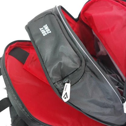 Open the Karakal Pro Tour 30 2.1 Badminton Backpack in black and white, featuring multiple compartments. The lining is bright red and includes a section labeled "SOFT ZONE." Enjoy comfort with its padded shoulder straps, and notice the branded zipper pull.