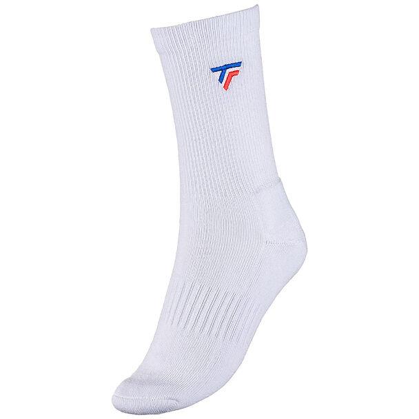 The Tecnifibre Men's Classic Badminton Socks (3 Pack) in white are designed with a ribbed texture and feature a subtle blue and red logo near the top, perfect for racket sports. These socks include ankle support and are showcased against a plain white background.