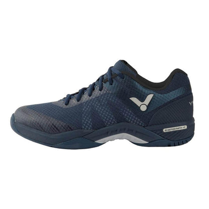 The Victor S82 Men's Badminton Shoes in Medieval Blue from the brand Victor are an athletic choice featuring a low-cut design and a breathable mesh upper. Adorned with the brand logo on the side, these shoes also incorporate wear-resistant TPU elements and a cushioned sole, making them ideal for both sports and casual use.