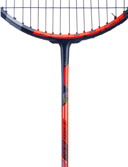 Close-up of the Babolat X-Feel Blast Badminton Racket - Red, showcasing its black and orange frame and strings with XP AERO TUBING technology for enhanced speed. The shaft is embellished with orange and black geometric designs, contributing to this head-heavy racket's distinctive appearance. The image focuses on the upper shaft and stringed area.