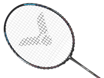 An overhead view of the Victor Auraspeed HS Plus 4U Badminton Racket - Black highlights its sleek black frame and white strings, designed with a distinctive pattern featuring three black triangular shapes at the center. Enhanced with Victor's WES 3.0 technology, its shaft boasts blue detailing for optimized performance.