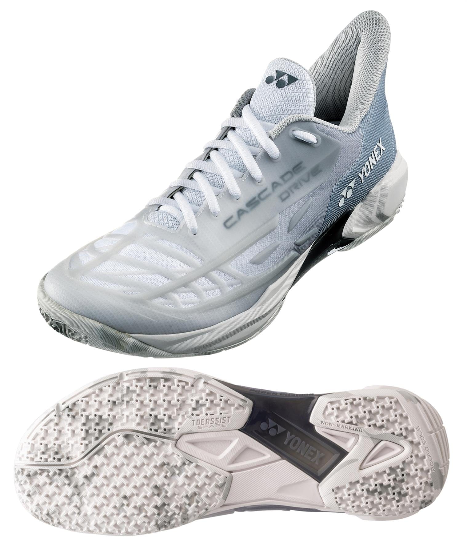 A pair of Yonex Power Cushion Cascade Drive 2 badminton shoes in matte white, featuring a sleek design with "CASCADEDRIVE" lettering on the side. The shoes incorporate Power Cushion technology and have a patterned sole for exceptional grip and support.