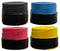 Three badminton overgrips from the Badminton HQ brand are arranged in a square. The colors include black, blue, red, and yellow. Each grip features a black band at the base.