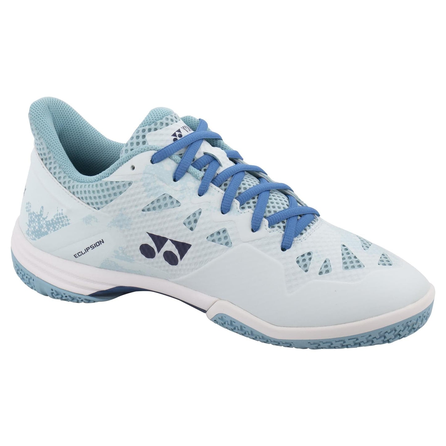 The Yonex Power Cushion Eclipsion Z3 Wide Men's Badminton Shoes in Light Blue showcase a patterned design with the Yonex logo on the side. They feature textured soles, blue laces, and are ideal for stability. The shoe is angled to highlight its side and front.