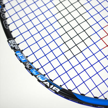 Close-up of a Karakal BZ 50 2.1 badminton racket head featuring a black frame and blue strings. The isometric square head showcases numeric specifications and the word "AIR," along with one distinctive black vertical string in its pattern.