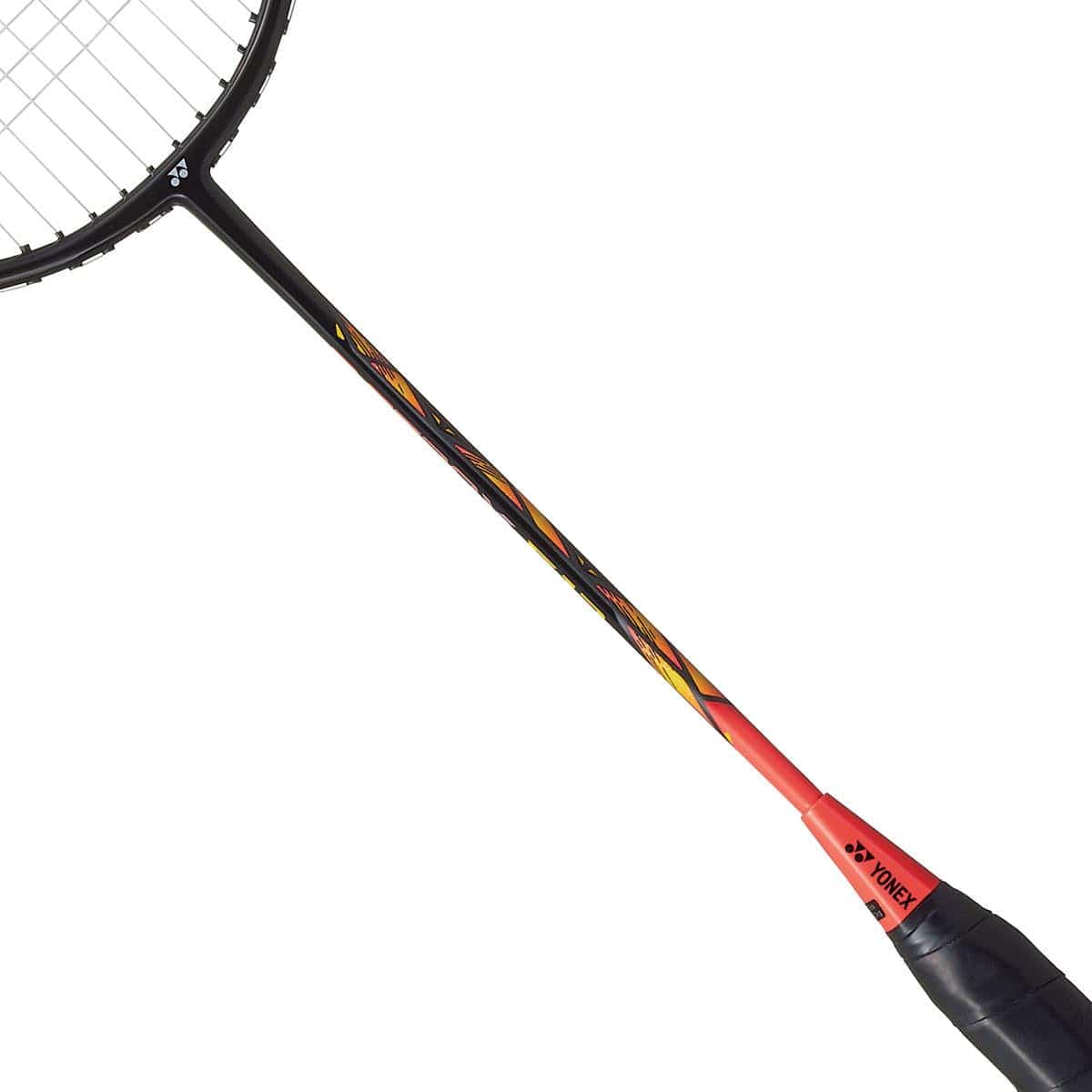 A close-up view of the Yonex Astrox E13 Badminton Racket - Black / Bright Red highlights its black and bright red design, featuring a patterned shaft and the Yonex logo near the handle. The racket's isometric head shape is positioned diagonally against a plain white background.