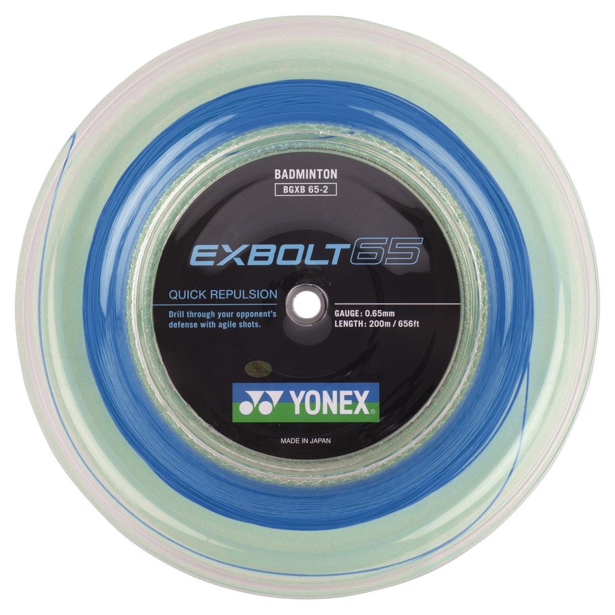 Yonex Exbolt 65 Badminton String Blue - 0.65mm 200m Reel boasts a transparent outer layer paired with blue FORGED FIBER internally. The central label details its specifications: a gauge of 0.65mm and a length of 200m/656ft, emphasizing its "Quick Repulsion" feature and proudly stating it is "Made in Japan," engineered to enhance smashing power.