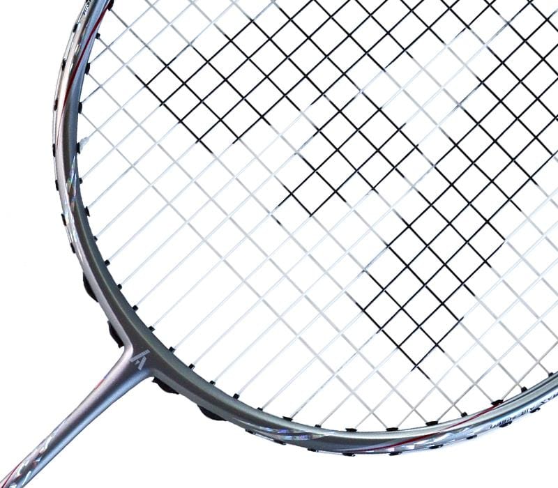 Close-up of a badminton racket, showcasing the string grid and metallic frame, reminiscent of the precision found in the Ashaway Phantom Shard 5 5U Badminton Racket - Blue. Set against a white background, this design features advanced Shardtech technology for enhanced performance.