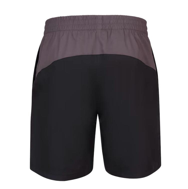 The Babolat Play Men's Shorts - Black display a stylish two-tone design from the back, with a gray top section and black bottom. Crafted using Fiberdry fabric, these shorts offer superior comfort and feature an elastic waistband for ease of movement. The 360 Motion technology further enhances athletic performance.