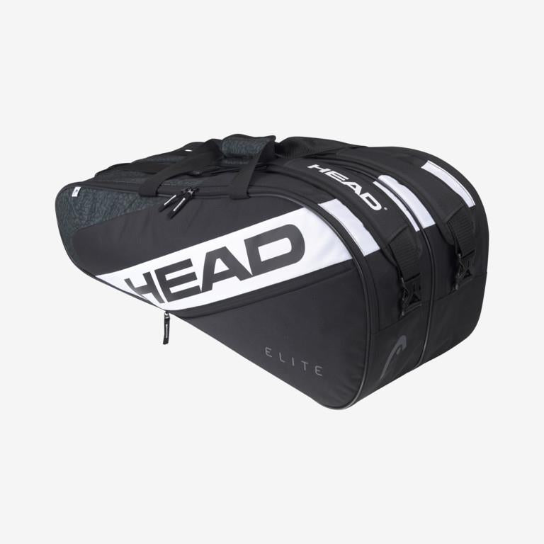 The HEAD Elite 9R Racket Bag - Black White boasts contemporary color schemes and a flexible 2-way carry system. This tennis bag from HEAD includes several compartments and zippers, all adorned with the "ELITE" label.