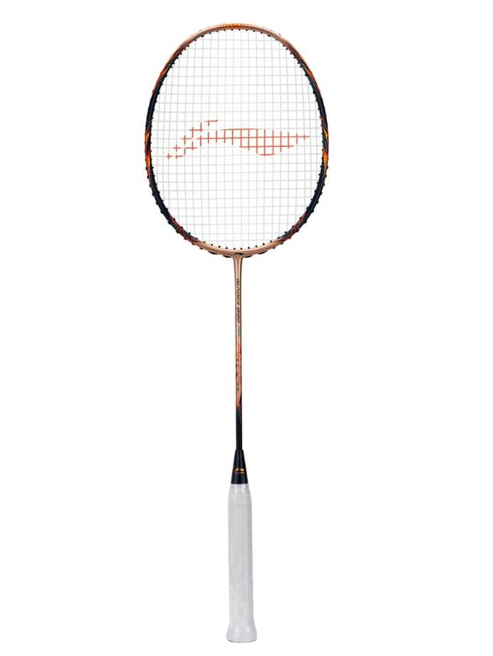 The Li-Ning BladeX 900 Sun Max 4U Badminton Racket in rose gold combines a sleek design with precise control and responsive gameplay, highlighting its unique aesthetic against a plain white background.