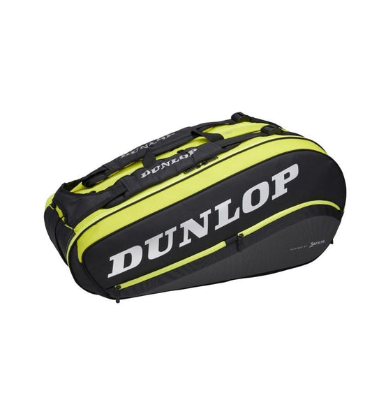 The Dunlop SX-Performance 8 Racket Thermo Bag, featuring a stylish black and yellow design and prominent white lettering, offers multiple compartments along with thermal insulation. It comes equipped with a strap for easy carrying, ensuring superior performance on the court.