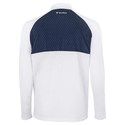 The back view of the Tecnifibre Men's Thermo Badminton Zipper Longsleeve features raglan sleeves and a navy geometric patterned panel across the shoulders. This white athletic shirt by Tecnifibre is crafted with a stretchy knit design and includes a small logo near the neckline for an extra touch of style.