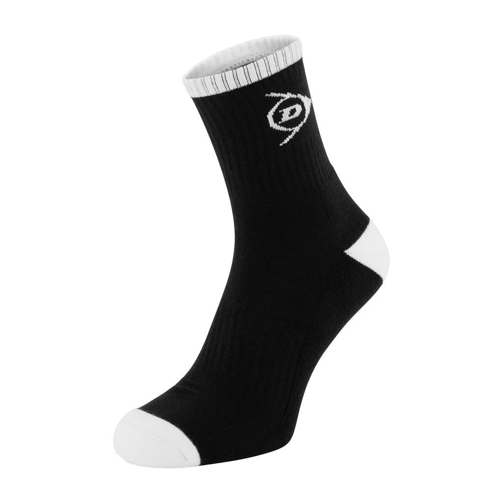 The Dunlop Performance Men's Sports Socks come in a stylish black design featuring a white logo and accents. Designed for comfort with ribbing, these socks rise to mid-calf and showcase a contrasting white toe, heel, and cuff. Ideal for performance, they stand out beautifully against the plain white background. Available in a 2 pack for sizes UK6-11.