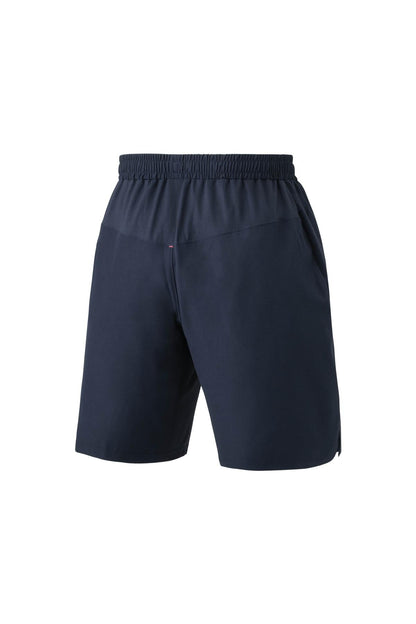 A pair of Yonex 15165 Men's Badminton Shorts in Indigo Marine, showcasing an elastic waistband and side pockets, designed with VeryCool technology for optimal comfort, against a white background.