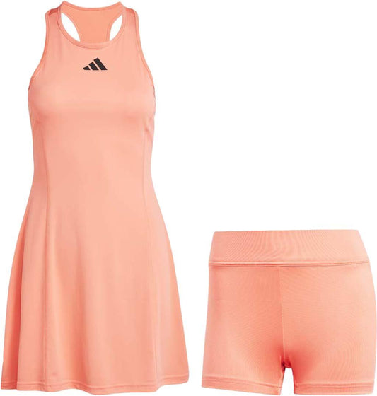 The adidas Womens Club Badminton Dress in Coral showcases a sleeveless design with a black logo on the chest and coordinating shorts. Made from Primegreen recycled materials, the dress features a racerback style and incorporates AEROREADY moisture-wicking fabric to ensure you stay cool and comfortable.