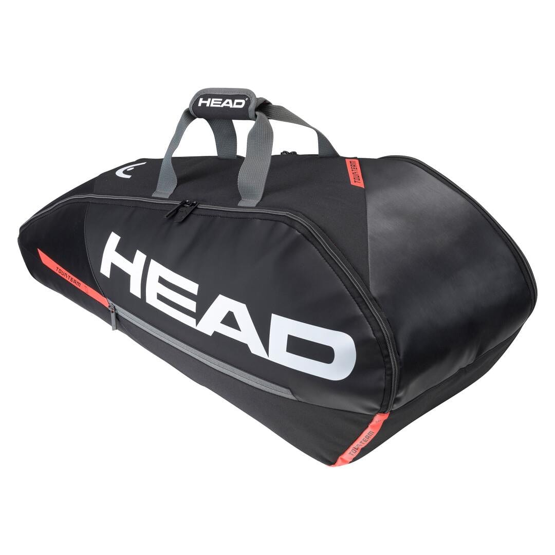 Introducing the HEAD Tour Team 6R Combi Badminton Bag in Black and Orange. This bag prominently displays a large white "HEAD" logo and features sleek orange accents. Designed with climate control technology, it offers ample space to store up to 6 rackets. The top handle ensures convenient carrying for athletes on the move.