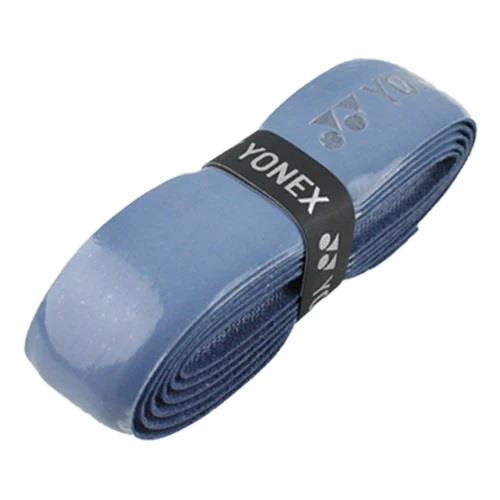 A Yonex AC420 Hi Soft Badminton Overgrip in Grey Blue, providing maximum comfort, is neatly coiled with a black band securing it in place.