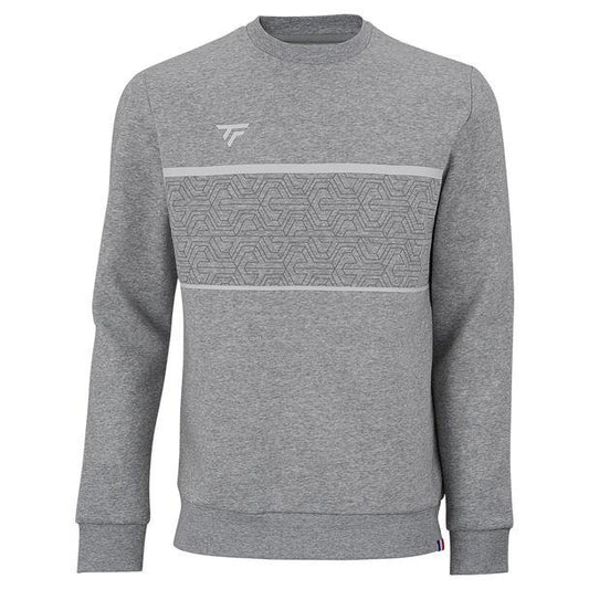 The Tecnifibre Men's Team Badminton Sweater - Silver offers a high-performance appearance with its gray long-sleeve crewneck style. It boasts a geometric pattern across the chest and a small logo on the upper left side, ensuring both style and comfort.