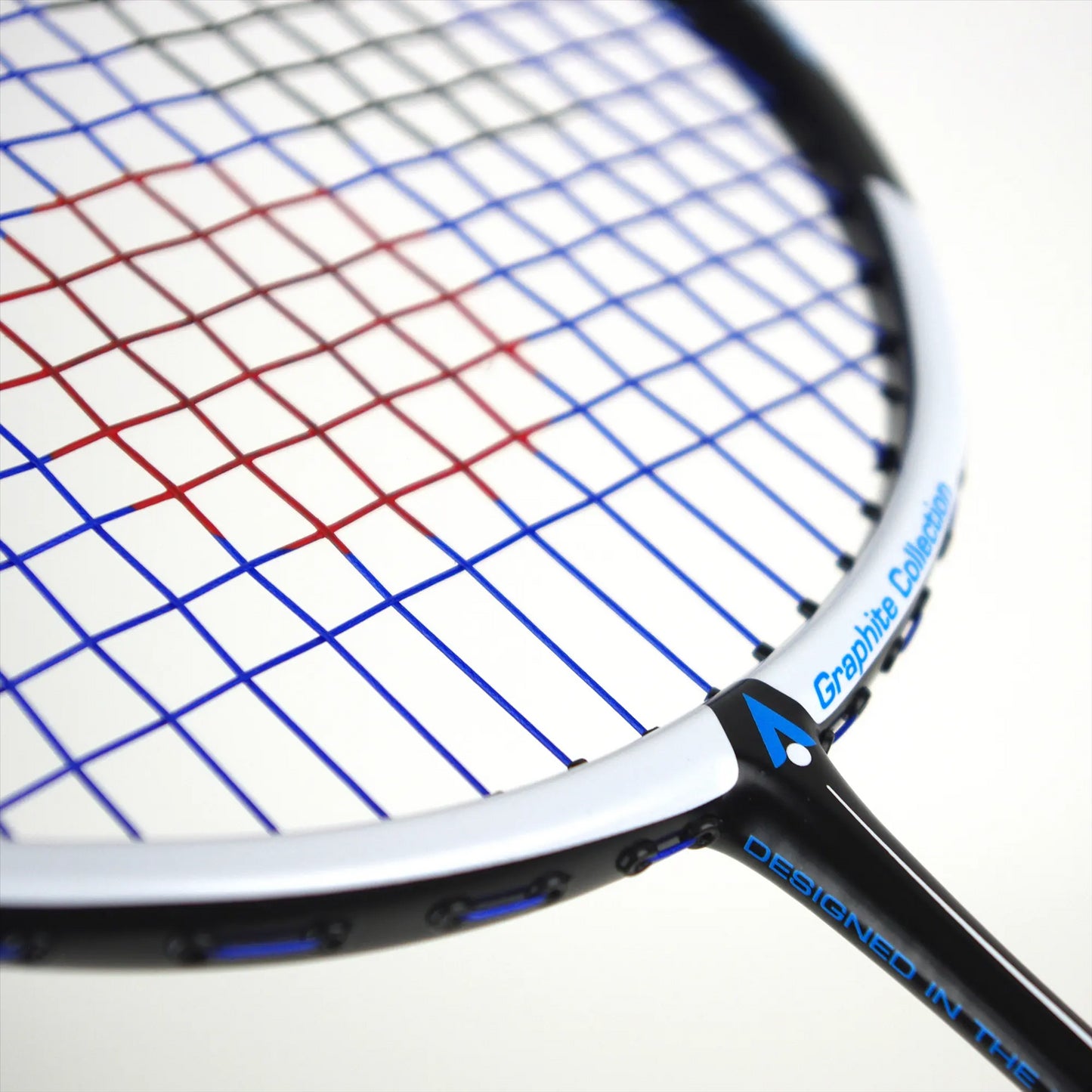 Close-up of a Karakal BZ 50 2.1 Badminton Racket featuring vibrant red and blue strings. The elegant, contemporary design showcases an isometric square head with "Graphite Collection" and "Designed in Taiwan" marked on the frame.