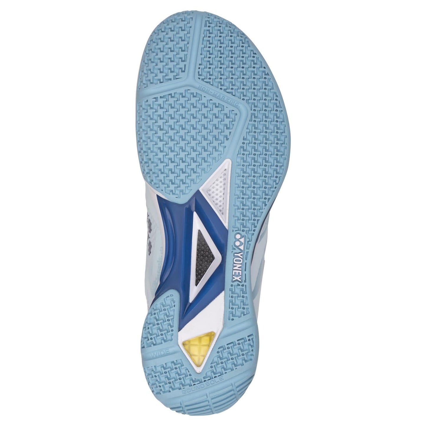 The image displays the sole of a Yonex Power Cushion Eclipsion Z3 Wide Men's Badminton Shoe in a light blue and white design. It features a textured grip pattern with sections of light and dark blue, accented by a subtle yellow highlight, along with the Yonex logo for style and enhanced lateral shell support.