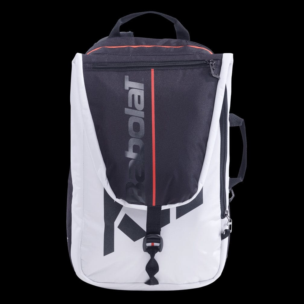 The Babolat Pure Strike Backpack - White / Red is a stylish black and white design featuring a large, zippered compartment with an isothermal insulated section to maintain the coolness of your badminton essentials. It showcases a red accent stripe and the vertical display of "Babolat," along with handles for convenient carrying.