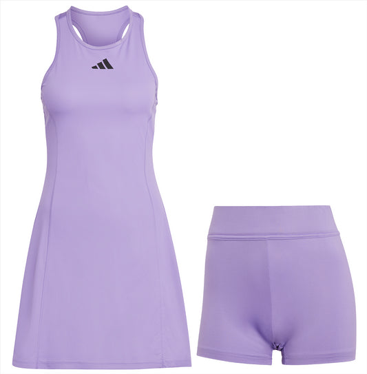 The Adidas Women's Club Badminton Dress in purple, designed without sleeves and showcasing a black logo on the chest, comes with matching purple shorts. Made from Primegreen recycled materials, it features AEROREADY moisture-wicking fabric to ensure comfort and coolness during play.