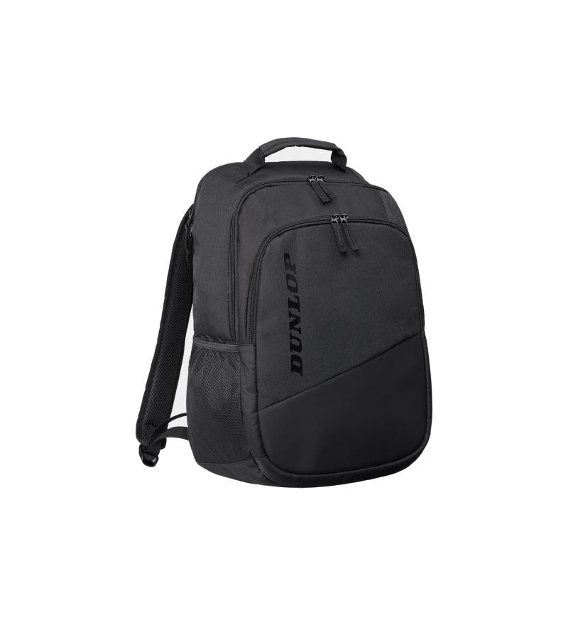 Presenting the Dunlop Team Backpack - Black: a sleek backpack with two main compartments for organized storage and enhanced racket protection. It includes a zippered front pocket, mesh side pocket, adjustable shoulder straps, and a top handle. The distinctive Dunlop logo is prominently displayed vertically on the front.