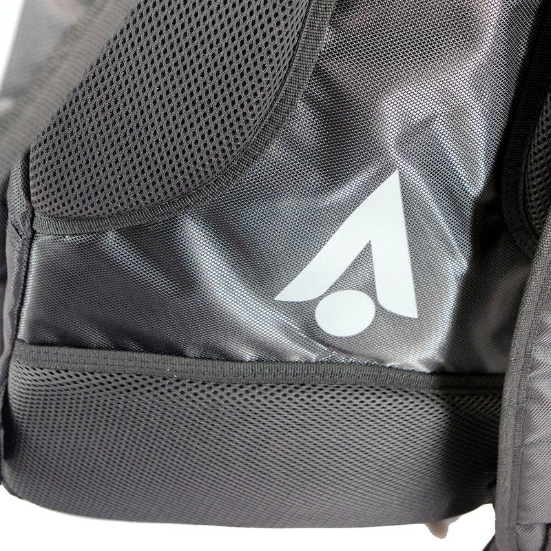 Close-up of the Karakal Pro Tour 30 2.1 Badminton Backpack – Black / Blue, highlighting its 30-litre capacity. The backpack features a black fabric with the brand's distinctive white logo that resembles an abstract arrow or triangle. It combines mesh on the top section and solid material on the lower section for a stylish yet functional finish.