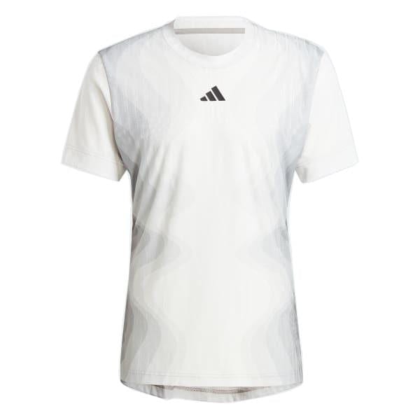 This ADIDAS Melbourne Men's Pro Badminton T-Shirt in grey is ideal for badminton and features a small black geometric logo on the chest. Made from Parley Ocean Plastic, it boasts subtle wavy patterns in light gray tones for a textured look.