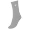 The Tecnifibre Men's Classic Badminton Socks (3 Pack) in silver, ideal for racket sports, are designed as mid-calf socks with a ribbed texture. Each sock showcases a small white geometric logo near the top, offering a stylish element to this simple and comfortable addition to your athletic wardrobe.