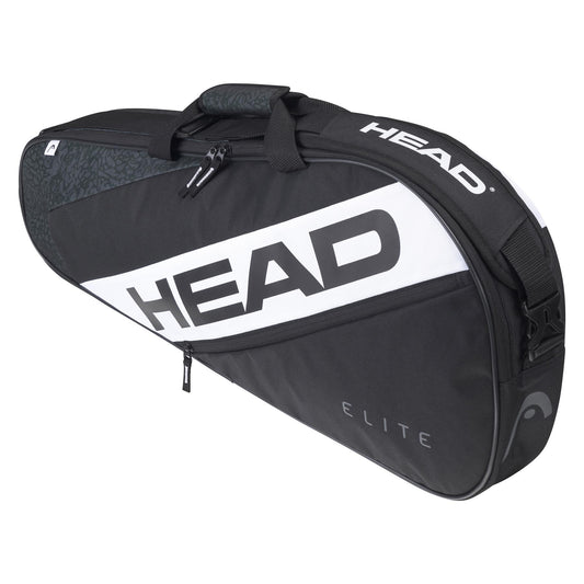 The HEAD Elite 3R 3 Racket Bag - Black / White, made from recycled materials, showcases a stylish black and white look with prominent branding. It includes several zippered compartments, a practical top carrying handle, and an adjustable shoulder strap for effortless transportation.