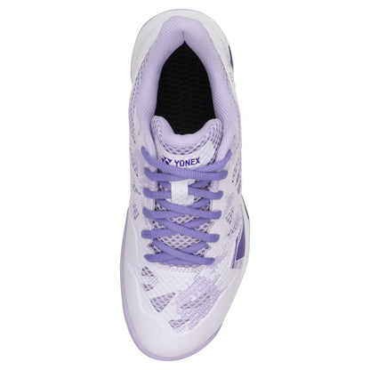 Top view of the Yonex Power Cushion Eclipsion Z3 Womens Badminton Shoes in white and purple, showcasing mesh detailing and purple laces, designed to improve footwork. The Yonex Power Cushion technology offers outstanding stability, with the brand name clearly displayed on the tongue.