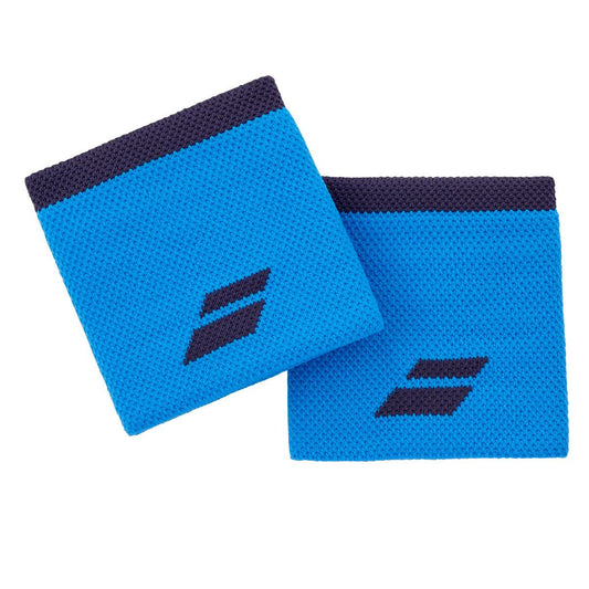 The Babolat Logo Wristband - Drive Blue, featuring two vibrant blue wristbands with dark blue edges and a diagonal stripe logo at the center, serve as perfect tennis accessories. These high-absorption wristbands are showcased on a white background, slightly overlapping each other.