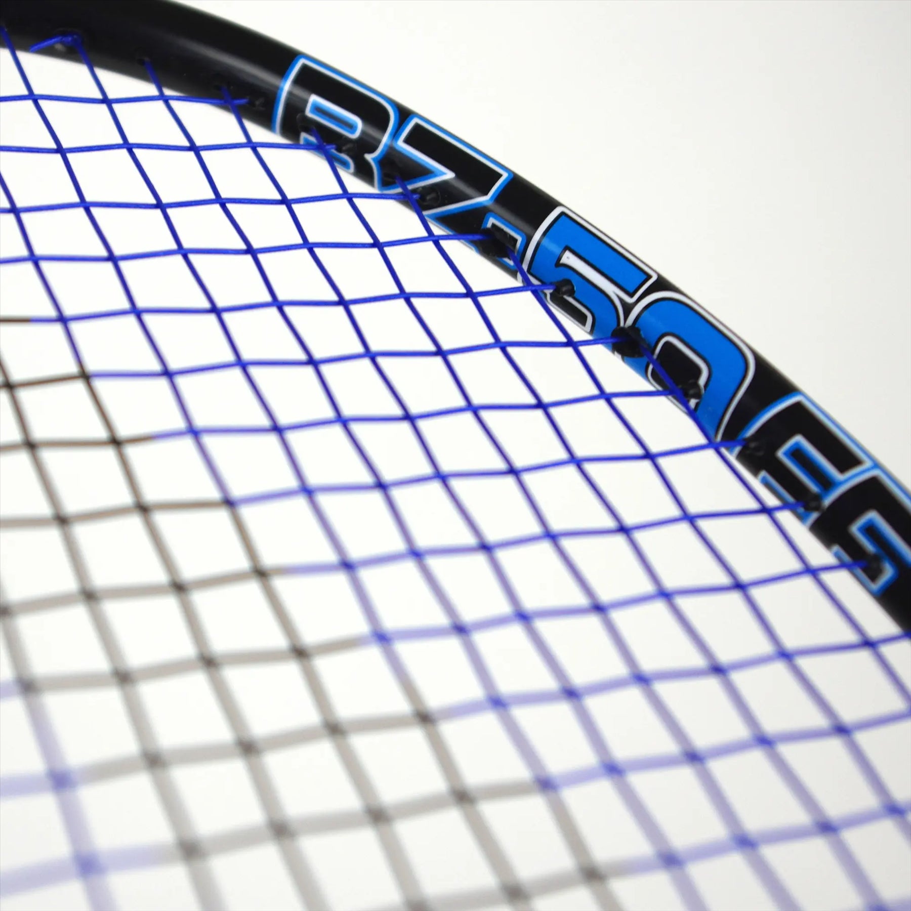 Close-up of a Karakal BZ 50 2.1 badminton racket's head, highlighting the strings and part of the frame with the model number "BZ-50" in blue text. The strings form a grid pattern against the white background.