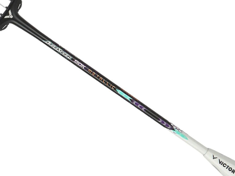 A Victor Auraspeed 90K Metallic 4U badminton racket in black and blue, this model by the brand Victor features colorful graphics on the shaft. It includes inscriptions "ARSPEED 90K MT-CALLIC" and "VICTOR" near the bottom. The racket is equipped with taut strings and a precision-designed frame incorporating advanced shock absorption technology for enhanced playability.