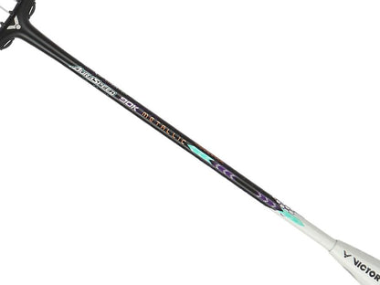 A Victor Auraspeed 90K Metallic 4U badminton racket in black and blue, this model by the brand Victor features colorful graphics on the shaft. It includes inscriptions "ARSPEED 90K MT-CALLIC" and "VICTOR" near the bottom. The racket is equipped with taut strings and a precision-designed frame incorporating advanced shock absorption technology for enhanced playability.