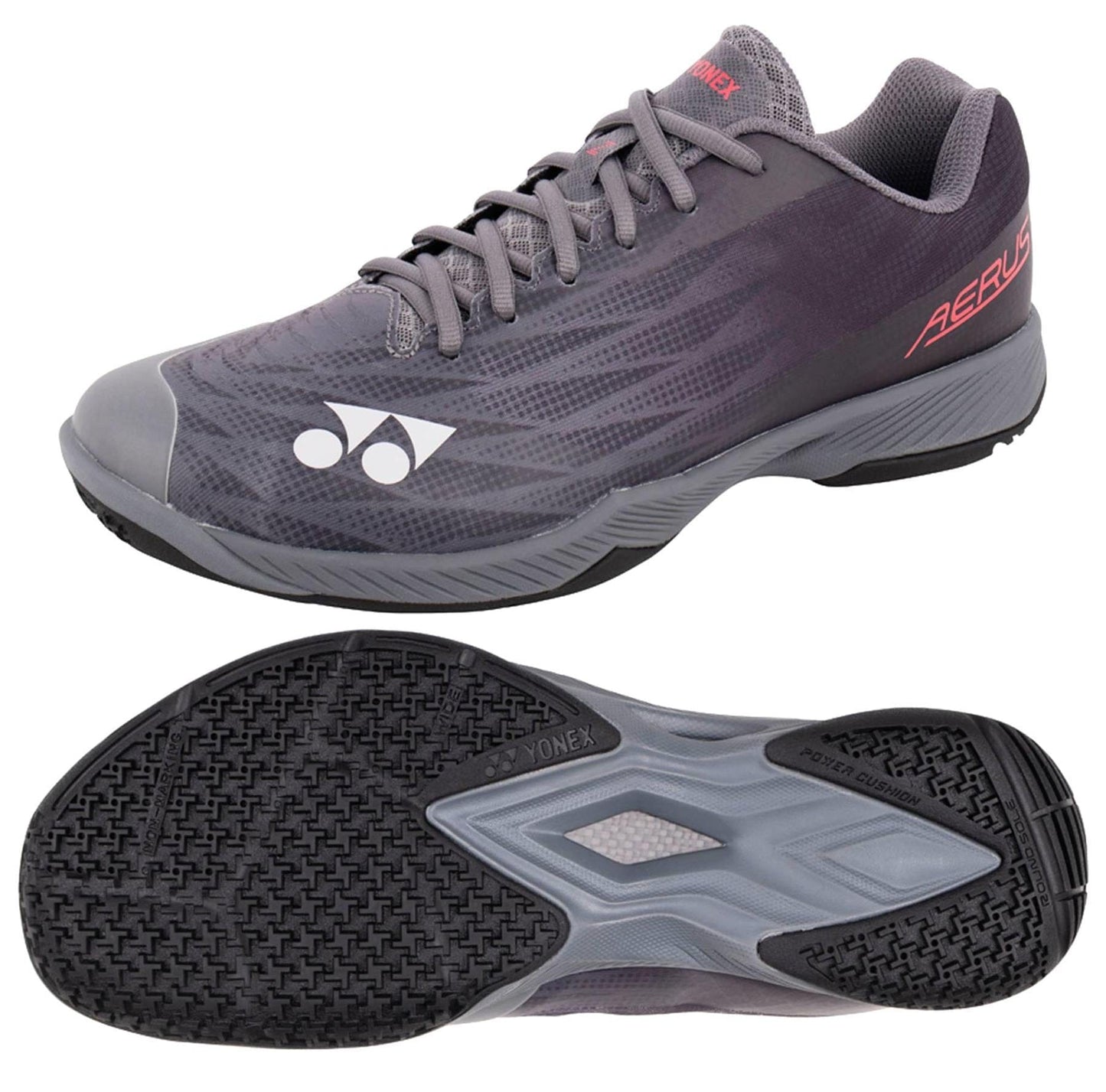 The Yonex Power Cushion Aerus Z2 Wide Men's Badminton Shoes in dark grey offer ultimate comfort with their signature Power Cushion technology, complemented by a textured sole for enhanced grip. The top view of the shoe highlights its side profile, and the bottom view showcases its tread pattern.