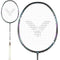 The Victor Drive X Metallic C 4U badminton racket, crafted by Victor, boasts a DYNAMIC-HEX frame and PYROFIL carbon fiber. Its black frame with white strings has a distinctive center logo. The sleek white handle is lightly gripped, shown in full-length and head close-up views.