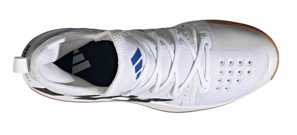 Top view of the ADIDAS Stabil Next Gen Primeblue Men's Badminton Shoes in Cloud White and Core Black, an athletic indoor court shoe featuring a gum sole. The design includes perforations for breathability, BOOST technology for comfort, a loop at the heel, and adidas branding on the tongue and insole.