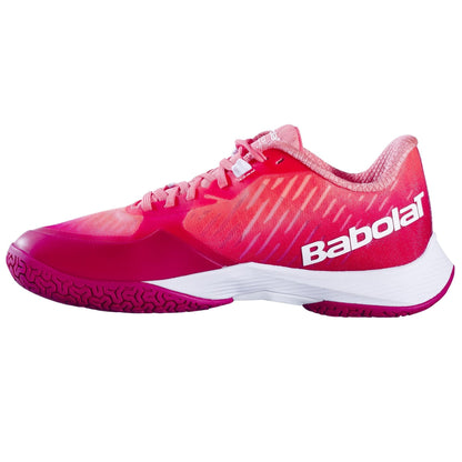 The Babolat Shadow Tour 5 Women's Badminton Shoes in Raspberry feature a vibrant pink and red color scheme with a herringbone tread pattern, making them perfect for clay courts. Lightweight and breathable, these shoes include white branding on the side and a secure lace-up closure, ideal for active women's badminton sessions.