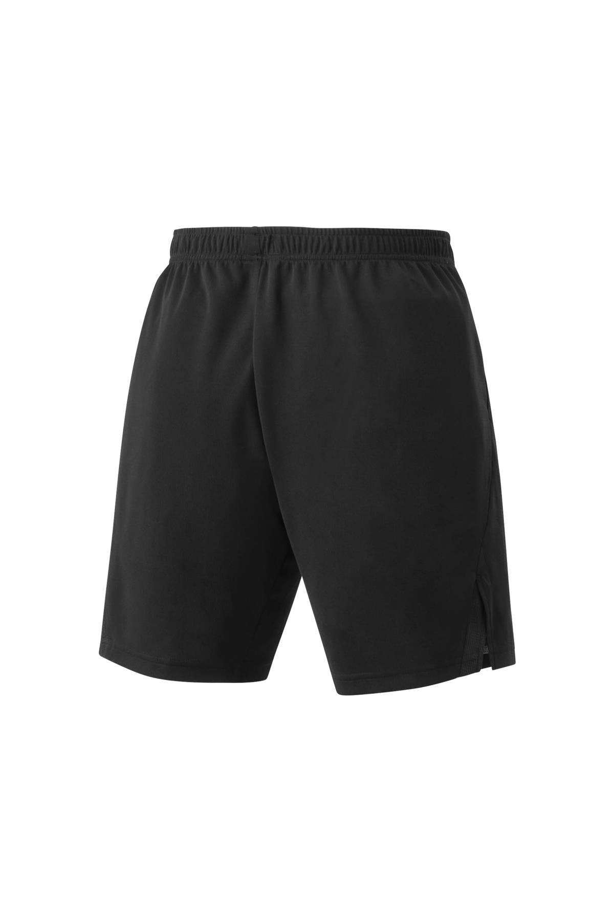 The Yonex 15170 Knit Men's Badminton Shorts in black showcase VeryCool Dry technology and have an elastic waistband with a minimalist design, highlighted in a back view. These shorts are made from smooth, lightweight material perfect for both sports and casual wear. They also feature a subtle side slit to enhance mobility.